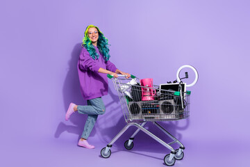 Let's swap. Vivid haired lady youth pull trolley with old stuff sell garage sale isolated over...