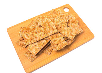 Pile of bread cracker snacks isolated over the white background