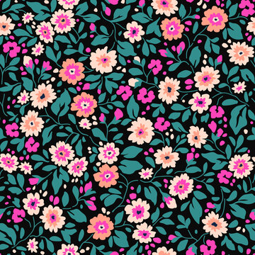 Cute floral pattern in the small flowers. Seamless vector texture. Elegant template for fashion prints. Printing with small pink and coral flowers. black background.
