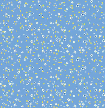 Vintage floral background. Floral pattern with small yellow and white flowers on a light blue  background. Seamless pattern for design and fashion prints. Ditsy style. Stock vector illustration.