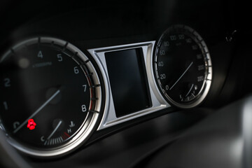 Naklejka premium Speedometer in the salon of a large black car