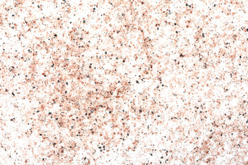 Black and pink volcanic salt on white background