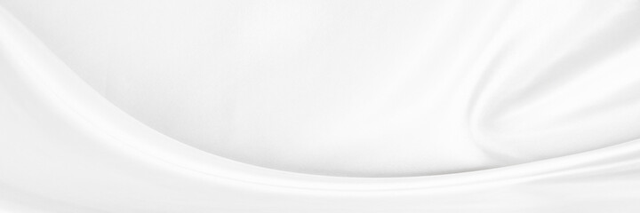 White gray satin texture that is white silver fabric silk background with beautiful soft blur pattern natural.