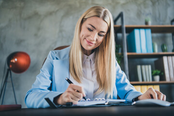 Photo of chief representative company owner lady sit table write note book partnership appointment days in modern workstation