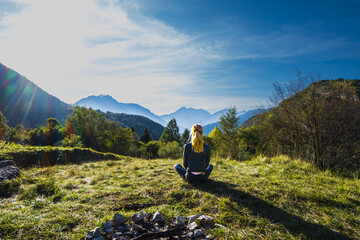 Girl gazing at the mountains in the distance