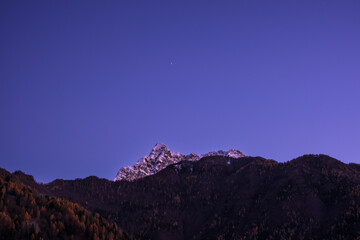 Snowy peak at dusk in the Dolomites