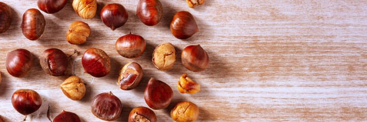 Chestnut panorama, shot from above on a rustic wooden background with a place for text