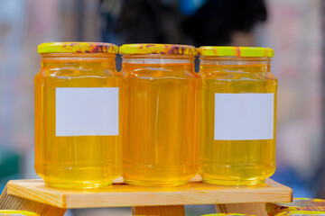 Fresh honey in jars with a place for a lettering