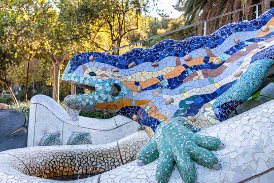 Famous mosaic lizard or salamander fountain in Park Guell. Mosaic sculpture in the Parc Guell designed by Antoni Gaudi located on Carmel Hill, Barcelona, Spain.
