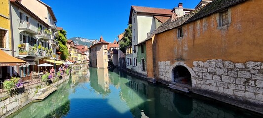 Canals with flowers and cafes in Annecy, France