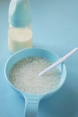 Close up of baby food in a bowl on table 