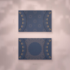 Blue business card with vintage brown pattern for your brand.