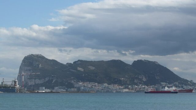Gibraltar rock from a beach a cloudy day, San Roque, Spain