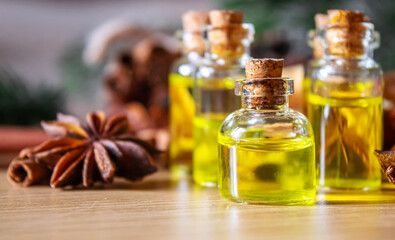 Christmas essential oils in a small bottle. Selective focus.