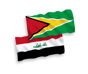 National vector fabric wave flags of Co-operative Republic of Guyana and Iraq isolated on white background. 1 to 2 proportion.