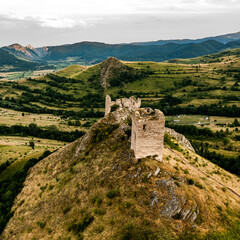 Fototapeta na wymiar Ruined castle on a cliff