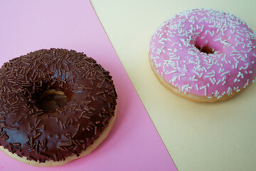 Food. Dessert. Dessert colorful snack. Delicious donut with sprinkles. Bakery cake. Sweet food dessert donuts. Close-up of donuts (Berlin pancakes)