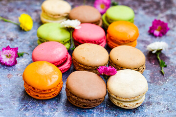 Selection of colorful french macaroons on   industrial background . Patisserie Banner