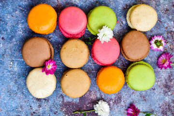 Selection of colorful french macaroons on   industrial background . Patisserie Banner