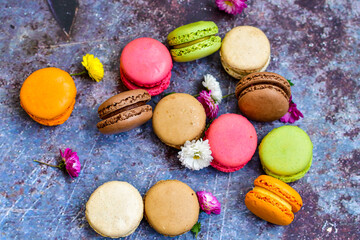  Colorful french macaroons on wooden background