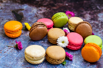  Colorful french macaroons on wooden background