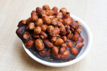 Gula kacang, is a traditional snack from Indonesia, made from roasted peanuts and brown sugar. Also called as Ampyang