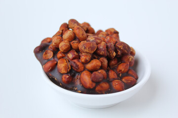 Gula kacang, is a traditional snack from Indonesia, made from roasted peanuts and brown sugar. Also called as Ampyang