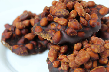 Gula kacang, is a traditional snack from Indonesia, made from roasted peanuts and brown sugar. Also called as Ampyang