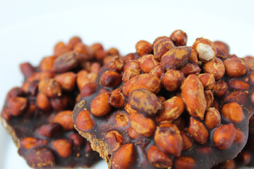 Gula kacang, is a traditional snack from Indonesia, made from roasted peanuts and brown sugar. Also called as Ampyang