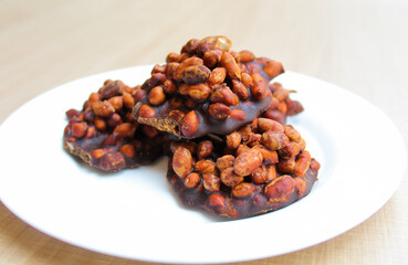 Gula kacang, is a traditional snack from Indonesia, made from roasted peanuts and brown sugar. Also called as Ampyang