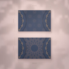 Blue colored business card with indian brown pattern for your brand.