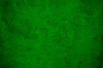 Fototapeta na wymiar Green grunge background. Concrete wall. Toned cement surface texture. Rough background with copy space for design.