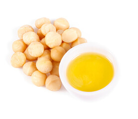 macadamia nut oil isolated on white backrgound