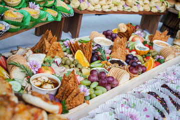 fruits, chips, dips platter with bacon and cheese