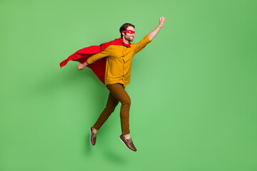 Full length profile photo of funky young superhero guy run wear mask courage shirt trousers shoes...
