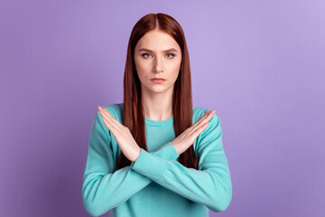 Photo of young woman crossed hands forbidden denial reject symbol isolated over violet color...