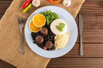 Feijoada typical Brazilian food. Traditional Brazilian food made with black beans. Top view. copy space
