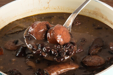 Feijoada typical Brazilian food. Traditional Brazilian food made with black beans