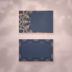 Business card in blue with a luxurious brown pattern for your personality.