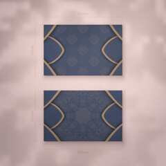 Business card in blue with a vintage brown pattern for your contacts.