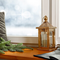 Christmas lamp on a window sill on a beautiful sunny day 