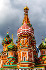Fototapeta na wymiar Colorful domes of the Cathedral of Vasily the Blessed commonly known as Saint Basil's Cathedral at Red Square in Moscow, Russia, Europe