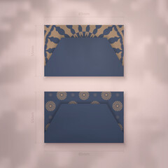 Business card in blue with brown mandala pattern for your personality.