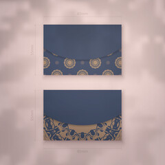 Business card in blue with greek brown ornaments for your business.