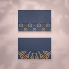 Business card in blue with Greek brown ornaments for your contacts.