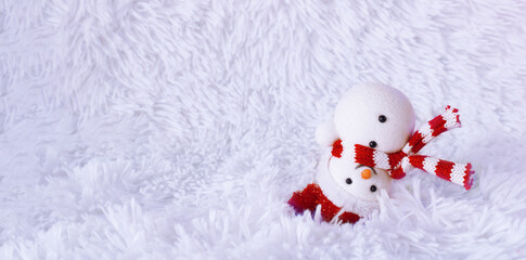 The snowman in the snow on the head. Minimal New Year and Christmas concept. Creative white christmas background.
