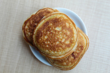 Kue Samir or Kamir or Khamir, traditional pancake from Pemalang, Indonesia. Wooden background. Flat lay or top view.