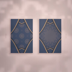 Business card in blue with luxurious brown ornaments for your business.