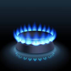 Gas burner with fire on a dark background