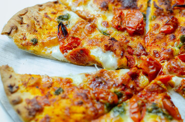 Delicious Neapolitan pizza based on buffalo mozzarella and tomatoes, italian cuisine